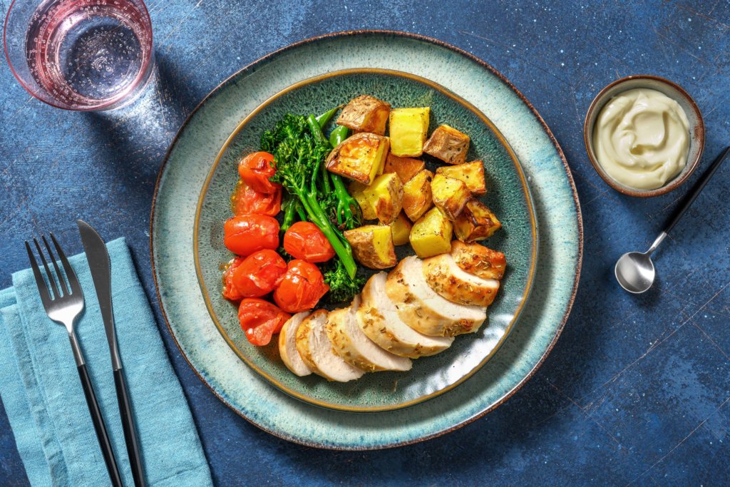 Rosemary Roast Chicken and Tomato 'Asteroids' with Mini Roast Potatoes and Tenderstem® Broccoli